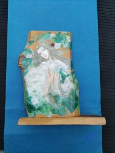 檜の板に切り絵を貼り付けて作った飾りは置き物に成りますサイズは縦30㎝横幅25㎝板の厚み2㎝です