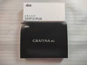 新品未使用 送料無料 au GRATINA 4G KYF31 黒 (卓上ホルダ付き、SIMフリー、判定〇)。