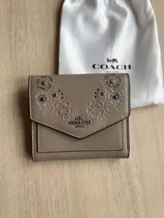 Coach 三つ折り財布(花柄)