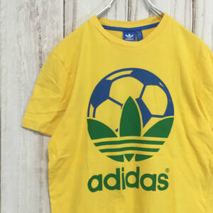 【アディダス 半袖ビッグロゴTシャツ】トレフォイル サッカー M 黄 adidas 古着 [240613-018]