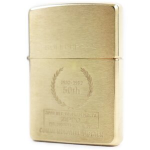 未使用品●ZIPPO ジッポ 50th SOLID BRASS ソリッドブラス 真鍮 COMMEMORATIVE 喫煙グッズ オイルライター ゴールド ケース付き メンズ