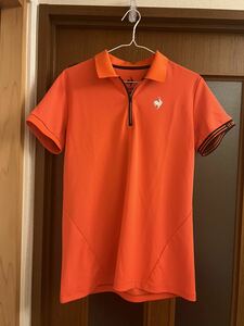 【新品・未使用】 Le coq sportif GOLF(ルコックゴルフ) RIJOUME フロントジップ ポロシャツ オレンジ色 Mサイズ