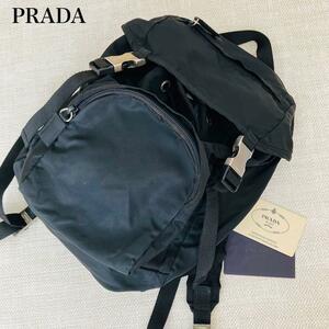 【美品】PRADA プラダ リュック バックパック ポコノ ナイロン 巾着 フラップ 三角ロゴ プレート ブラック 黒 