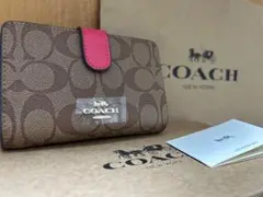 93 新品未使用 coach コーチ 二つ折り財布 シグネチャー