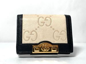 1672 未使用に近い GUCCI グッチ 676150　エンボス 2つ折り財布　アイボリー ブラック GG柄　コンパクト財布　ミニウォレット レディース　