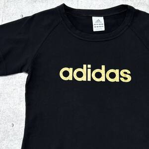 adidas レディースL ゴールド プリントロゴ Tシャツ 半袖 アディダス　　ストレッチ素材 ラグラン袖 ブラック センターロゴ 石瀬6109