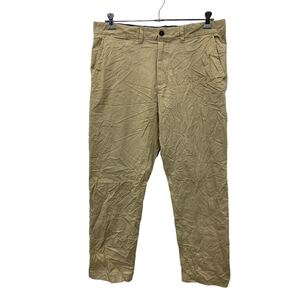 TOMMY HILFIGER チノパンツ W36 トミーヒルフィガー ベージュ ロゴ ビッグサイズ 古着卸 アメリカ仕入 2309-79