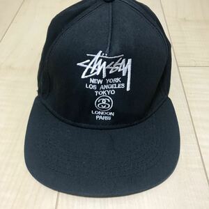 STUSSY World Tour Snapback Cap Black ステューシー ワールドツアー スナップバック NEW YORK LONDON PARIS CAP Black 黒