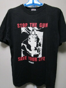 ＰＡＺＺＯ　プリントＴシャツ（STOP THE GUN SAVE YOUR LIFEパッゾカンパニーＤＣブランド90s80sビンテージ昭和レトロＴシャツ）