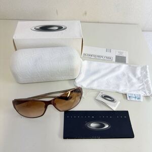 【新品同様】Oakley オークリー Behave A 05-313J 6217 ビヘイヴ サングラス レディース メンズ　ブロンズ系　チタン、セル　OK244227