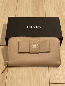 PRADA プラダ 1M0506 サフィアーノレザー ラウンドファスナー 長財布 ウォレット 小銭入れ ジップ リボン ピンクベージュ