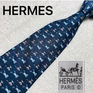 ■美品■HERMES エルメス　ネクタイ　ネズミのオモチャを追うネコ　シルク100% フランス製　ブルー系　ビジネス