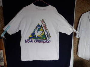 ＵＳＡ　Ｃｈａｍｐｉｏｎ　　Ｔシャツ　　白地にペリカンのイラストと文字入り　　　Ｌサイズ