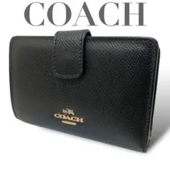 【美品】COACH 二つ折り財布　ゴールド馬車金具　シグネチャー　オールレザー黒