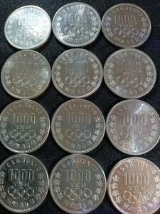 東京オリンピック1000円銀貨 12枚セット 汚れ無く綺麗な銀貨 です。シルバー925　純銀総重量222g銀貨状態は綺麗です。銀貨総重量約240g