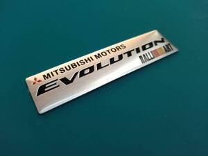 【ゆうパケット送料込】MITSUBISHI MOTORS EVOLUTION　エンブレムプレート　縦2.5cm×横10.2cm×厚さ1ｍｍ　三菱　ラリーアート