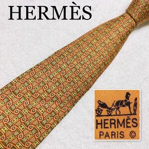 ■美品■HERMES エルメス　ネクタイ　装飾柄　総柄　シルク100% フランス製　オレンジブラウン